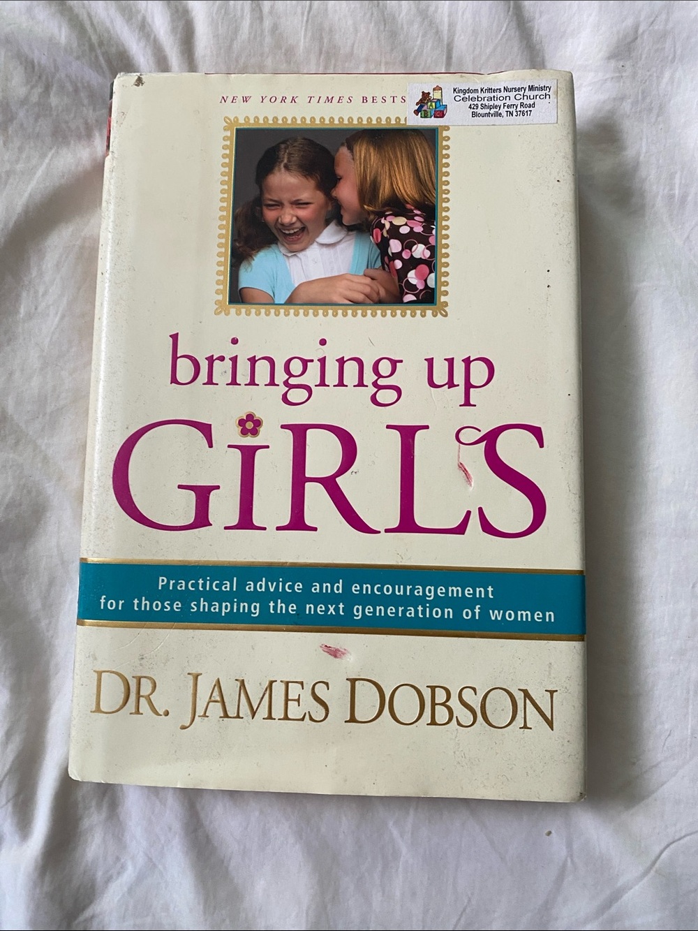 Bringing Up Girls by Dr. James Dobson — White Cover with Pink Title